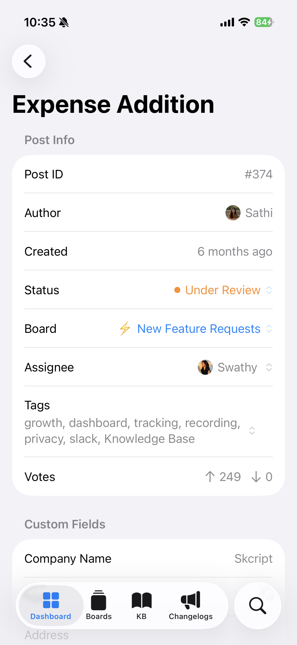 FeatureOS iOS post detail with status, board, assignee, and votes